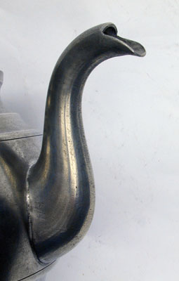 A Pewter Inverted Mold Pewter Teapot by J.B. Woodbury