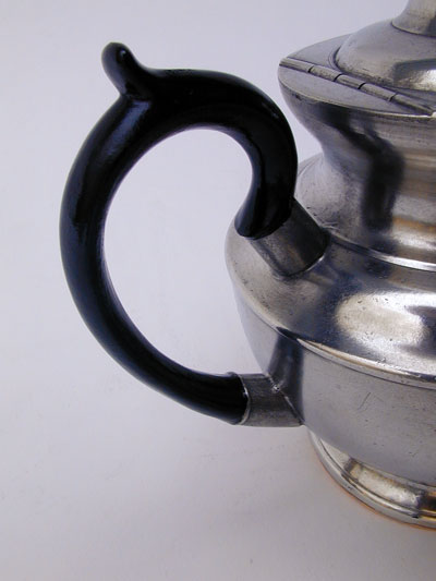 An Unmarked One Cup Boardman Pewter Teapot with Copper Bottom