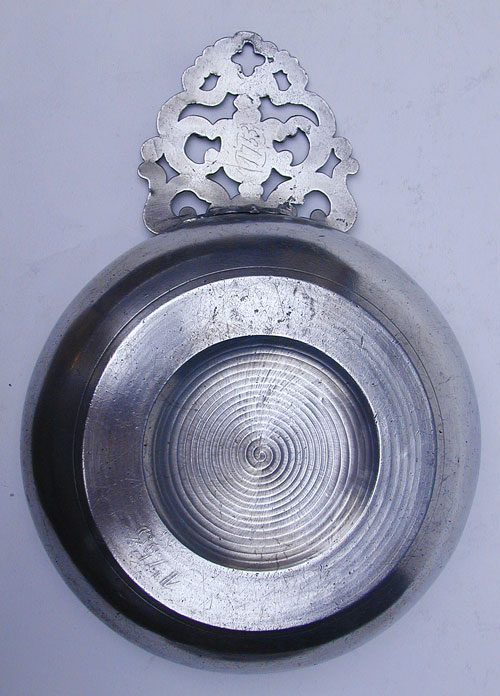 A Scarce Rhode Island Flower Handled Pewter Porringer by David Melville