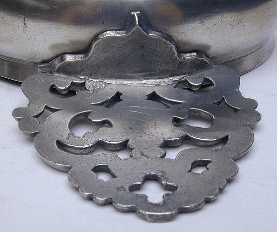 A Scarce Rhode Island Flower Handled Pewter Porringer by David Melville