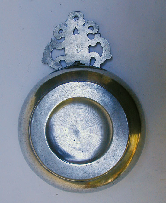 A Very Scarce Example of a Frederick Bassett Large Old English Handled Porringer