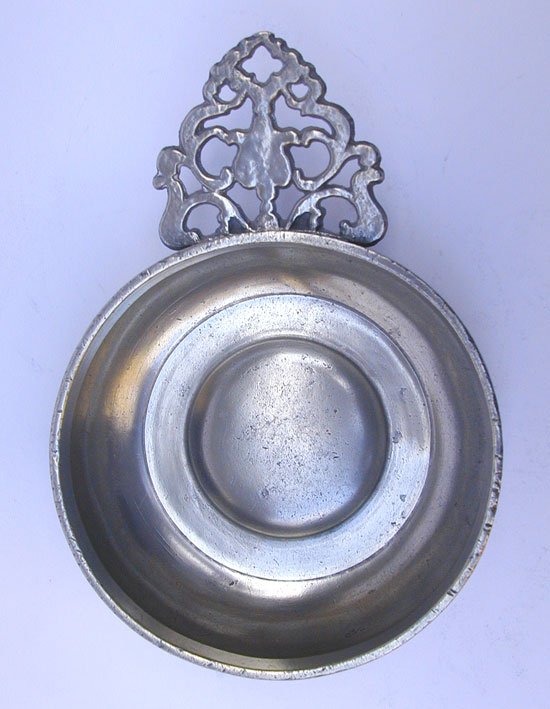 An Unmarked Boston Flower Handle Porringer