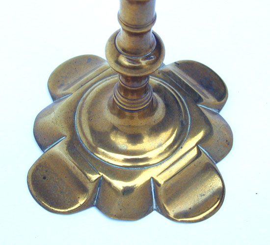 A Queen Anne Petal Base Brass Candlestick